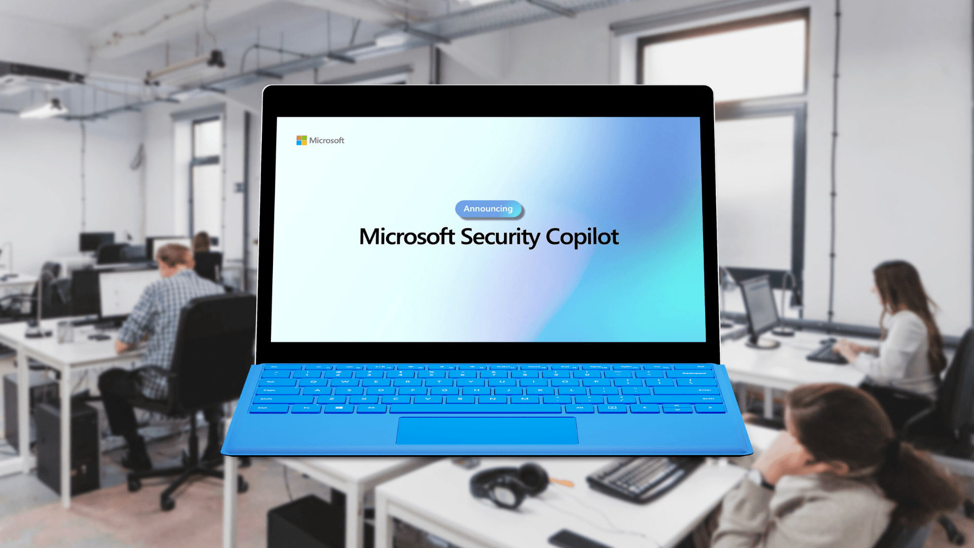 image with a laptop displaying ‘Announcing Microsoft Security Copilot’ in an office setting with people working in the background.