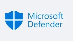 Microsoft Defender logo featuring a blue shield with a white cross and the text 'Microsoft Defender'.