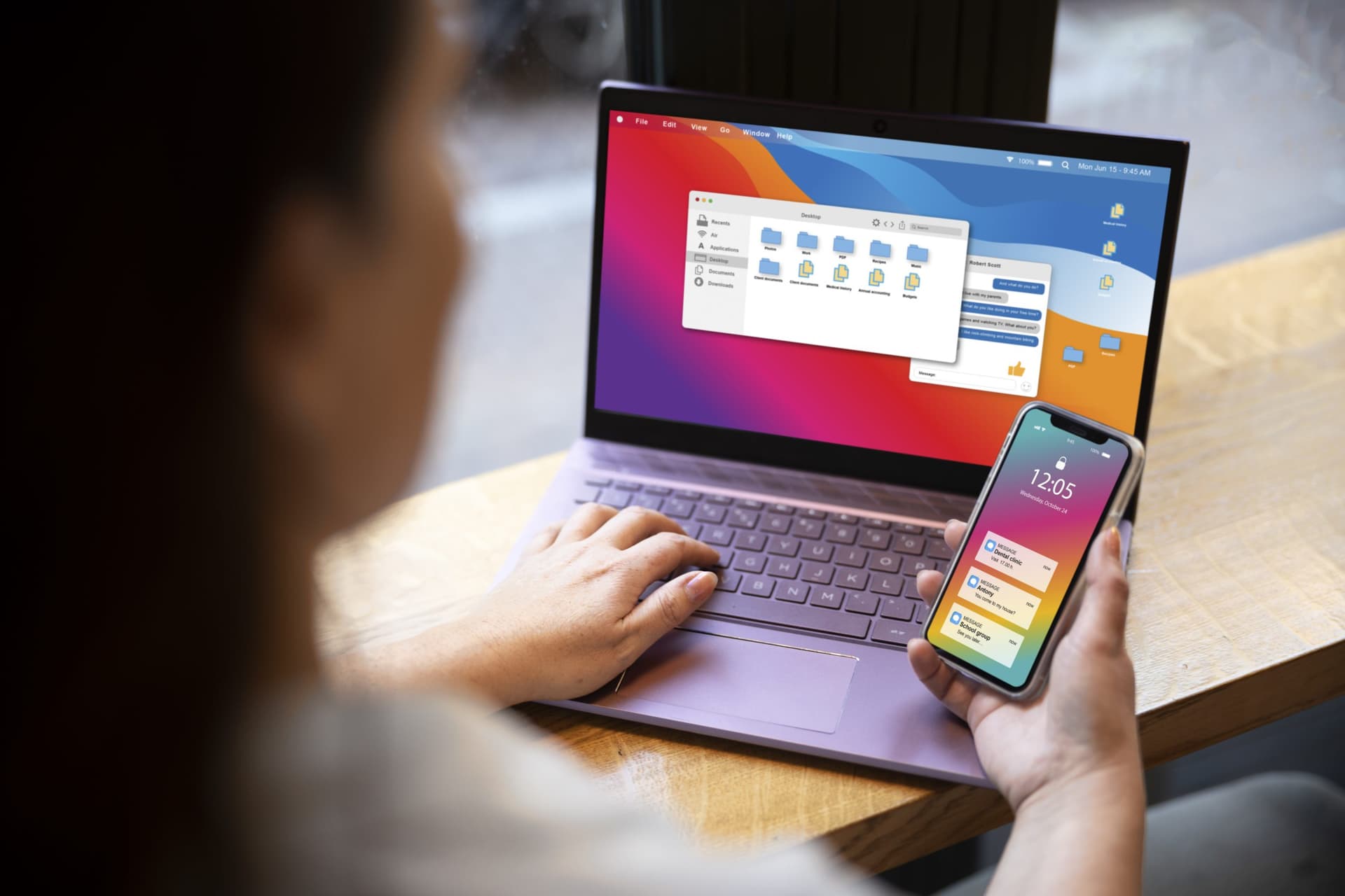 Person using a laptop and smartphone, displaying desktop folders and mobile widgets, representing cross-device access to static web apps."