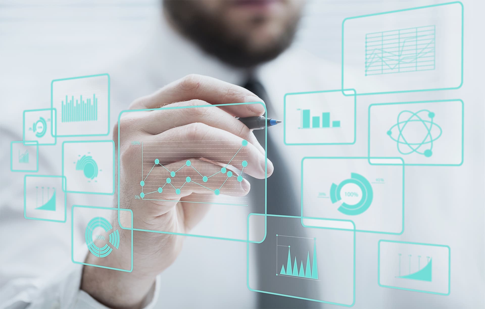 Person interacting with a virtual interface displaying data visualizations like graphs and charts, representing Power Apps capabilities.