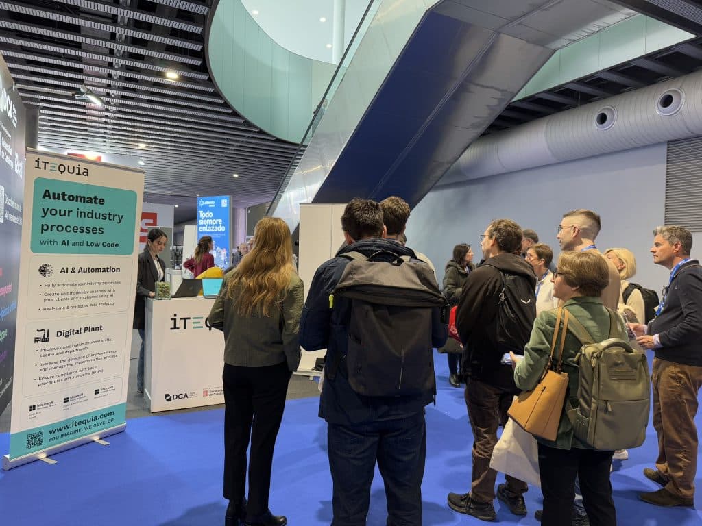 ITEQUIA booth at Advanced Factories 2025 with banner promoting AI and Low Code automation solutions.