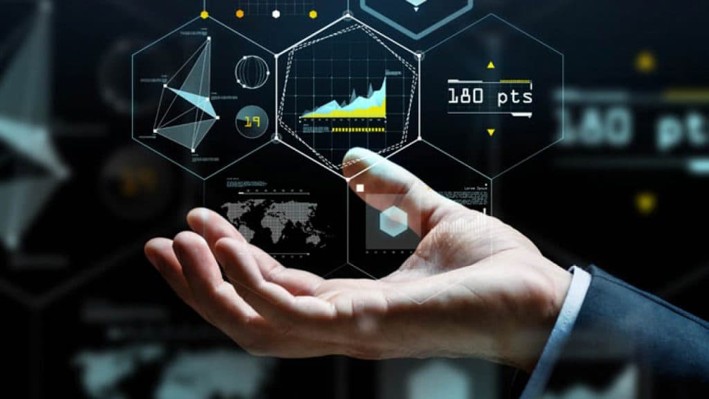 Hand holding holographic graphs and charts, symbolizing performance data analysis and visualization with Azure App Insights.