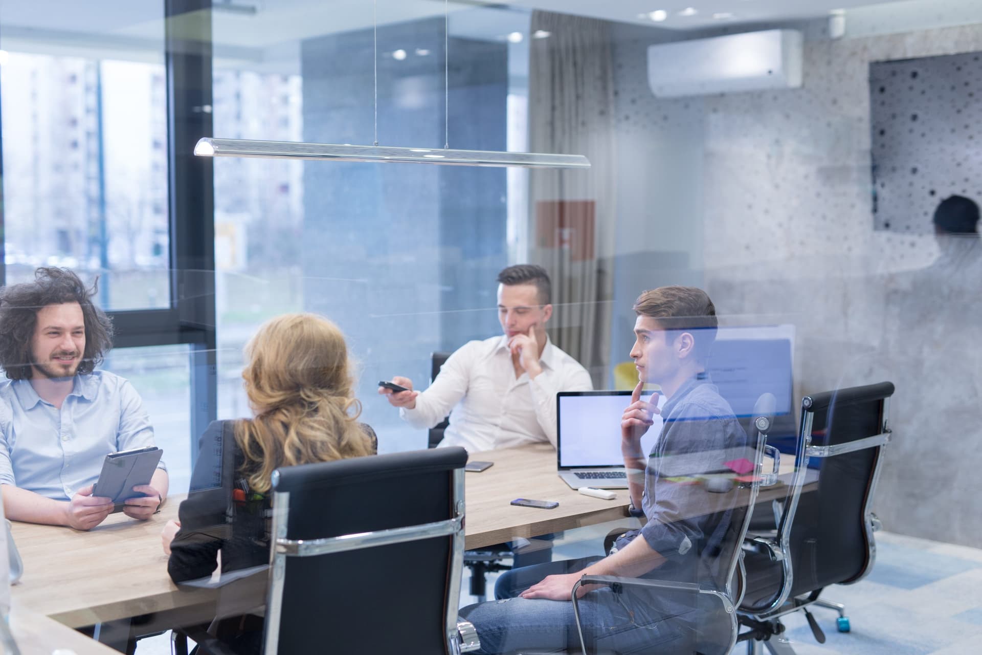 Itequia Software Care IT team gathered in office meeting room