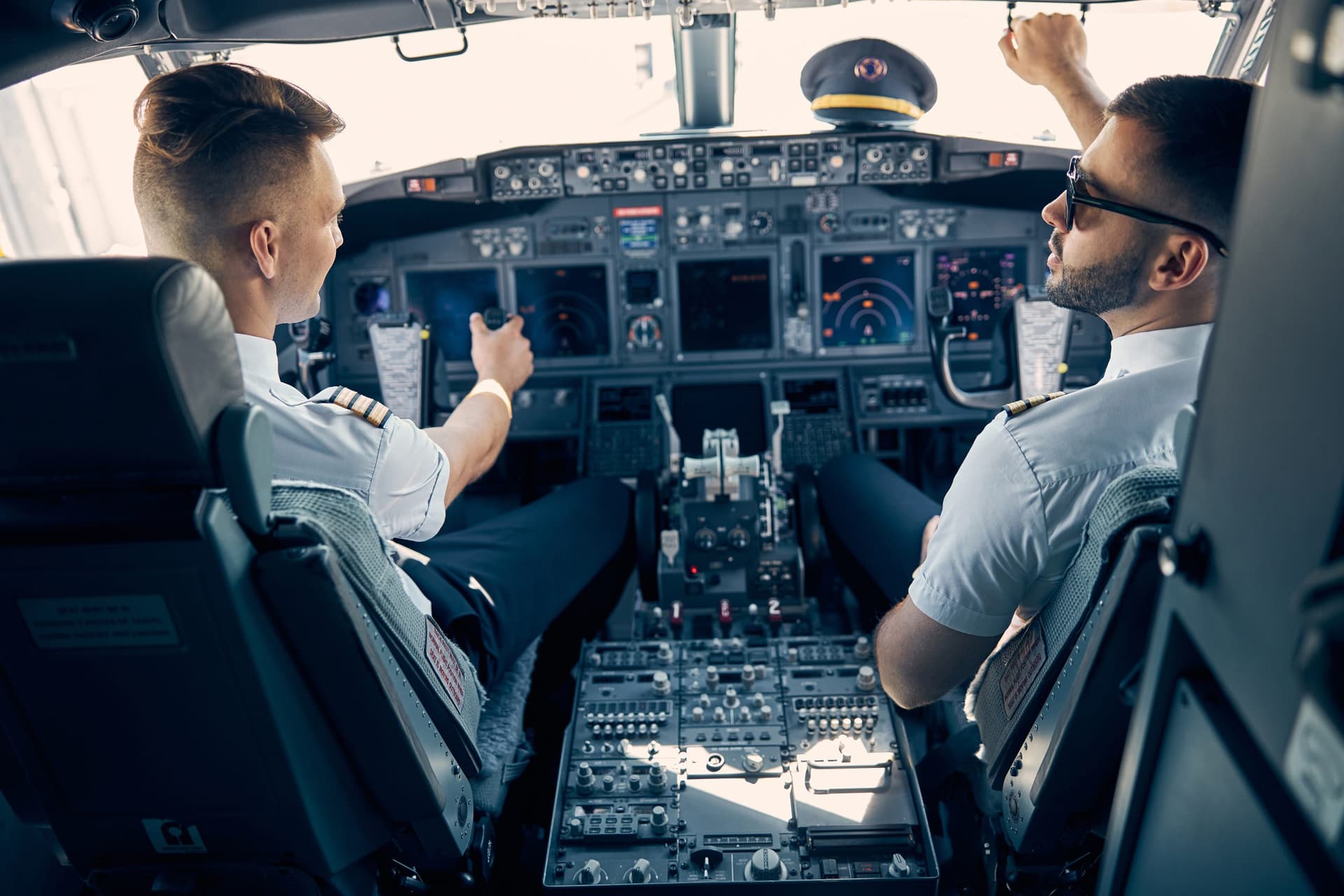 pilot and copilot on a plane that represents the idea of Microsoft 365 Copilot